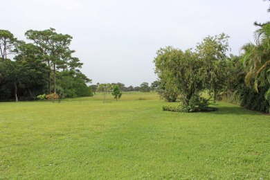 Your own private paradise in this 3/2/2 CBS home in desirable on Martin County Golf Course in Florida - for sale on GolfHomes.com, golf home, golf lot