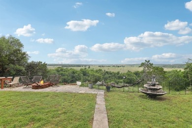 Exquisite luxury meets tranquil outdoors with this stunning home on Pecan Plantation Country Club in Texas - for sale on GolfHomes.com, golf home, golf lot