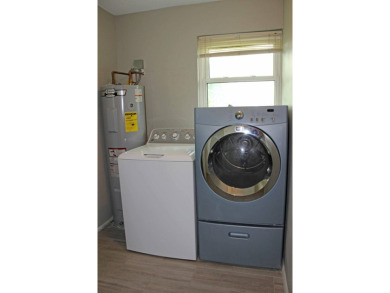 Your own private paradise in this 3/2/2 CBS home in desirable on Martin County Golf Course in Florida - for sale on GolfHomes.com, golf home, golf lot