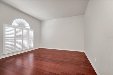 One or more photos have been virtually stagede take a look at on Kings Ridge Golf Club in Florida - for sale on GolfHomes.com, golf home, golf lot