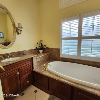 Welcome to 1324 Dovercourt Lane, nestled in the charming city of on Halifax Plantation Golf Club in Florida - for sale on GolfHomes.com, golf home, golf lot