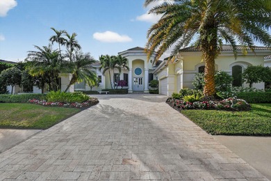 A prized location with sweeping panoramic golf and water views on BallenIsles Golf and Country Club in Florida - for sale on GolfHomes.com, golf home, golf lot