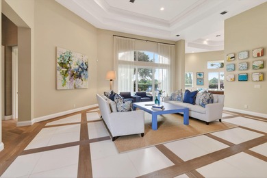 A prized location with sweeping panoramic golf and water views on BallenIsles Golf and Country Club in Florida - for sale on GolfHomes.com, golf home, golf lot