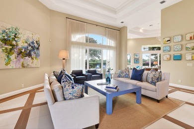 A prized location with sweeping panoramic golf and water views on BallenIsles Golf and Country Club in Florida - for sale on GolfHomes.com, golf home, golf lot