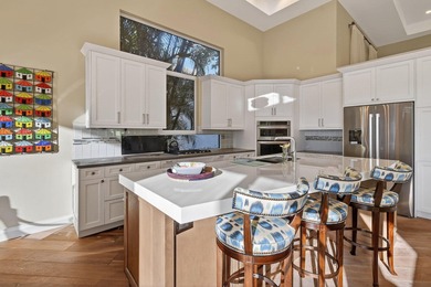 A prized location with sweeping panoramic golf and water views on BallenIsles Golf and Country Club in Florida - for sale on GolfHomes.com, golf home, golf lot