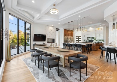 A one-of-a-kind modern masterpiece on Lake Norman. Crafted for on Trump National Golf Club Charlotte in North Carolina - for sale on GolfHomes.com, golf home, golf lot