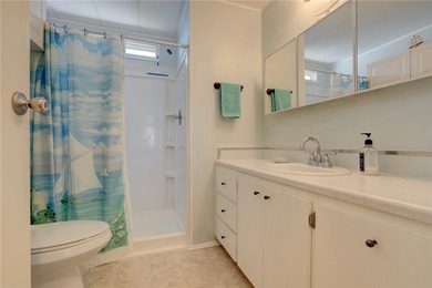 Cute and cozy fully furnished home offering relaxed on Barefoot Bay Golf Course in Florida - for sale on GolfHomes.com, golf home, golf lot