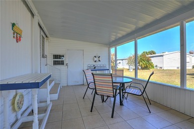 Cute and cozy fully furnished home offering relaxed on Barefoot Bay Golf Course in Florida - for sale on GolfHomes.com, golf home, golf lot