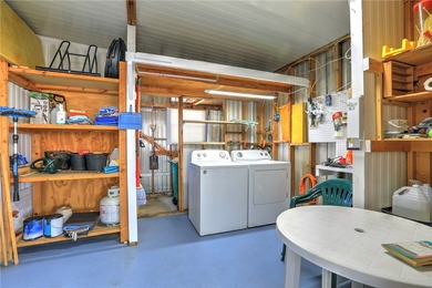 Cute and cozy fully furnished home offering relaxed on Barefoot Bay Golf Course in Florida - for sale on GolfHomes.com, golf home, golf lot