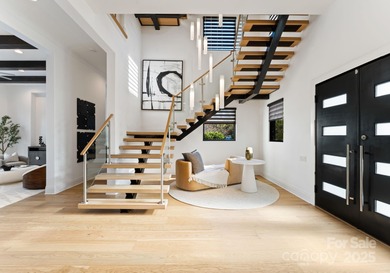 A one-of-a-kind modern masterpiece on Lake Norman. Crafted for on Trump National Golf Club Charlotte in North Carolina - for sale on GolfHomes.com, golf home, golf lot