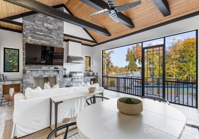 A one-of-a-kind modern masterpiece on Lake Norman. Crafted for on Trump National Golf Club Charlotte in North Carolina - for sale on GolfHomes.com, golf home, golf lot