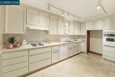 Treasured Rossmoor condo - comfort views  lifestyle! This on Rossmoor Golf Course in California - for sale on GolfHomes.com, golf home, golf lot