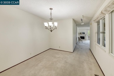 Treasured Rossmoor condo - comfort views  lifestyle! This on Rossmoor Golf Course in California - for sale on GolfHomes.com, golf home, golf lot