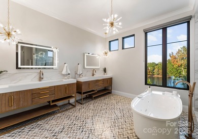 A one-of-a-kind modern masterpiece on Lake Norman. Crafted for on Trump National Golf Club Charlotte in North Carolina - for sale on GolfHomes.com, golf home, golf lot