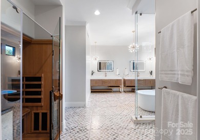 A one-of-a-kind modern masterpiece on Lake Norman. Crafted for on Trump National Golf Club Charlotte in North Carolina - for sale on GolfHomes.com, golf home, golf lot