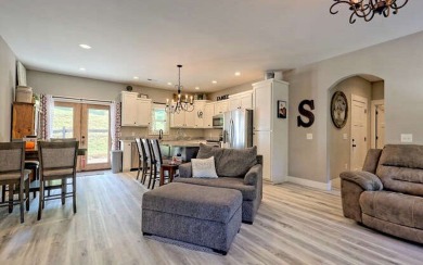 One Level Craftsman style home with Seasonal Lake and Mountain on Mountain Harbour Golf Club in North Carolina - for sale on GolfHomes.com, golf home, golf lot