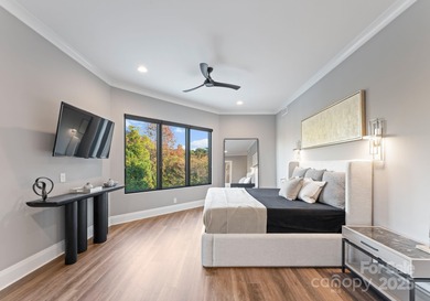 A one-of-a-kind modern masterpiece on Lake Norman. Crafted for on Trump National Golf Club Charlotte in North Carolina - for sale on GolfHomes.com, golf home, golf lot