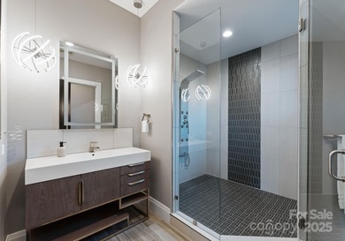A one-of-a-kind modern masterpiece on Lake Norman. Crafted for on Trump National Golf Club Charlotte in North Carolina - for sale on GolfHomes.com, golf home, golf lot