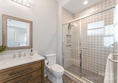 A one-of-a-kind modern masterpiece on Lake Norman. Crafted for on Trump National Golf Club Charlotte in North Carolina - for sale on GolfHomes.com, golf home, golf lot