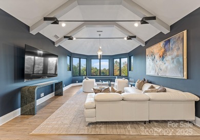 A one-of-a-kind modern masterpiece on Lake Norman. Crafted for on Trump National Golf Club Charlotte in North Carolina - for sale on GolfHomes.com, golf home, golf lot