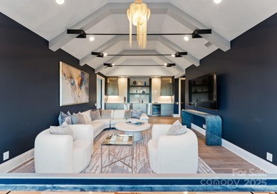 A one-of-a-kind modern masterpiece on Lake Norman. Crafted for on Trump National Golf Club Charlotte in North Carolina - for sale on GolfHomes.com, golf home, golf lot