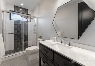 A one-of-a-kind modern masterpiece on Lake Norman. Crafted for on Trump National Golf Club Charlotte in North Carolina - for sale on GolfHomes.com, golf home, golf lot