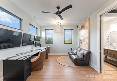 A one-of-a-kind modern masterpiece on Lake Norman. Crafted for on Trump National Golf Club Charlotte in North Carolina - for sale on GolfHomes.com, golf home, golf lot