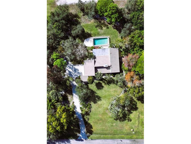 Contemporary Estate-Rare opportunity to own a pool home on over on Martin Downs Country Club in Florida - for sale on GolfHomes.com, golf home, golf lot