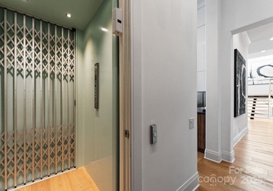 A one-of-a-kind modern masterpiece on Lake Norman. Crafted for on Trump National Golf Club Charlotte in North Carolina - for sale on GolfHomes.com, golf home, golf lot