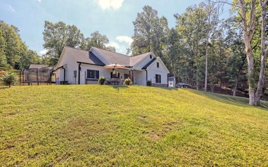 One Level Craftsman style home with Seasonal Lake and Mountain on Mountain Harbour Golf Club in North Carolina - for sale on GolfHomes.com, golf home, golf lot