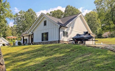 One Level Craftsman style home with Seasonal Lake and Mountain on Mountain Harbour Golf Club in North Carolina - for sale on GolfHomes.com, golf home, golf lot