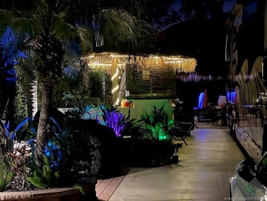 YOUR TROPICAL OASIS AWAITS! Ideally situated near the north on St. Lucie Trail Golf Club in Florida - for sale on GolfHomes.com, golf home, golf lot