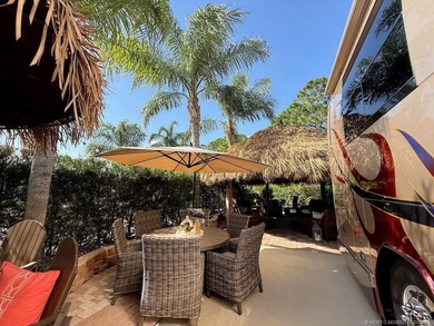 YOUR TROPICAL OASIS AWAITS! Ideally situated near the north on St. Lucie Trail Golf Club in Florida - for sale on GolfHomes.com, golf home, golf lot
