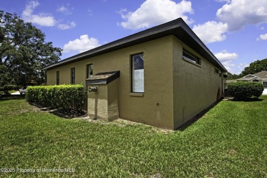 Looking for a place with a tropical vibe? Then come and on Glen Lakes Country Club in Florida - for sale on GolfHomes.com, golf home, golf lot