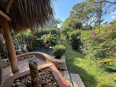 YOUR TROPICAL OASIS AWAITS! Ideally situated near the north on St. Lucie Trail Golf Club in Florida - for sale on GolfHomes.com, golf home, golf lot