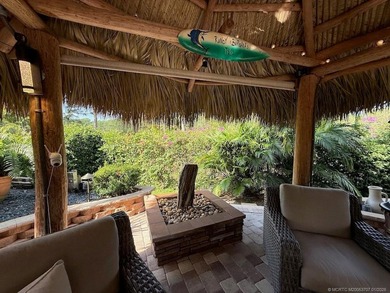 YOUR TROPICAL OASIS AWAITS! Ideally situated near the north on St. Lucie Trail Golf Club in Florida - for sale on GolfHomes.com, golf home, golf lot