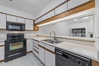 This adorable townhome in Inland Greens offers the perfect blend on Inland Greens Golf Course in North Carolina - for sale on GolfHomes.com, golf home, golf lot