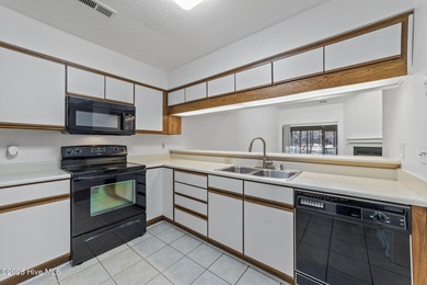 This adorable townhome in Inland Greens offers the perfect blend on Inland Greens Golf Course in North Carolina - for sale on GolfHomes.com, golf home, golf lot