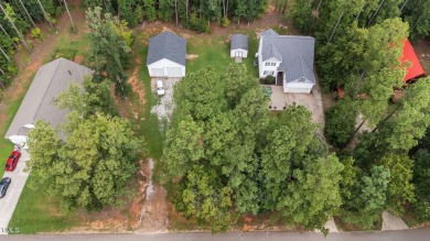 Welcome to your dream home in the beautiful, gated community of on River Golf and Country Club at Lake Royale in North Carolina - for sale on GolfHomes.com, golf home, golf lot