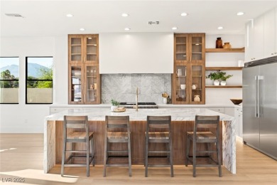 Perched on an elevated lot with panoramic golf and Red Rock on Red Rock Country Club in Nevada - for sale on GolfHomes.com, golf home, golf lot