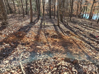 This Badin Lake waterfront lot is located in the prestigious on Old North State Club at Uwharrie Point Golf community in North Carolina - for sale on GolfHomes.com, golf home, golf lot