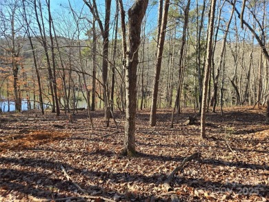 This Badin Lake waterfront lot is located in the prestigious on Old North State Club at Uwharrie Point Golf community in North Carolina - for sale on GolfHomes.com, golf home, golf lot