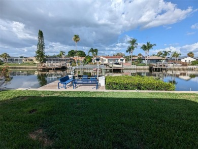 Under contract-accepting backup offers. Mid-century modern block on Rocky Point Golf Course in Florida - for sale on GolfHomes.com, golf home, golf lot