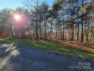 This Badin Lake waterfront lot is located in the prestigious on Old North State Club at Uwharrie Point Golf community in North Carolina - for sale on GolfHomes.com, golf home, golf lot