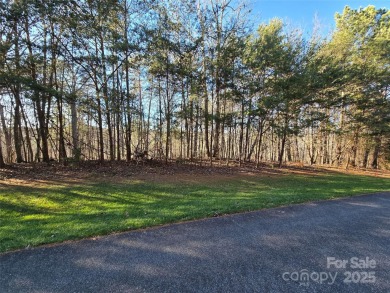 This Badin Lake waterfront lot is located in the prestigious on Old North State Club at Uwharrie Point Golf community in North Carolina - for sale on GolfHomes.com, golf home, golf lot