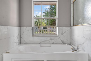 SELLER MOTIVATED! Welcome to your next chapter in this beautiful on Stonegate Golf Club in Florida - for sale on GolfHomes.com, golf home, golf lot