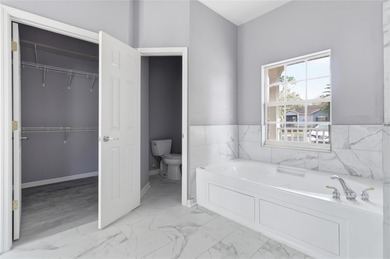 SELLER MOTIVATED! Welcome to your next chapter in this beautiful on Stonegate Golf Club in Florida - for sale on GolfHomes.com, golf home, golf lot