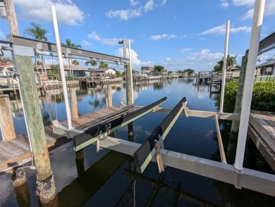 Under contract-accepting backup offers. Mid-century modern block on Rocky Point Golf Course in Florida - for sale on GolfHomes.com, golf home, golf lot