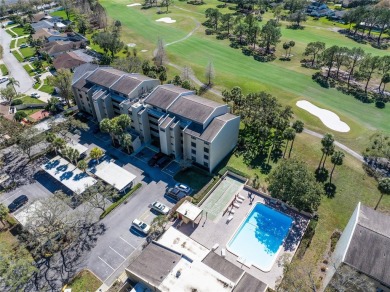 Stunning 2-Bedroom Condo with Golf Course Views in Carrollwood on Carrollwood Country Club in Florida - for sale on GolfHomes.com, golf home, golf lot