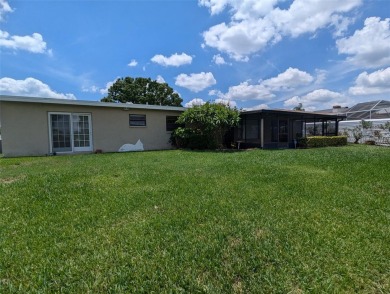 Under contract-accepting backup offers. Mid-century modern block on Rocky Point Golf Course in Florida - for sale on GolfHomes.com, golf home, golf lot